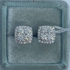 Beautiful Diamond Stud Earrings White Gold.  These cushion shape diamond studs are unique than your round studs.  Excellent craftsmanship and diamond quality, these sparkles beautifully on the ear.  Just the right size to wear all the time.  The center cluster of diamonds are set with minimal prongs showing for the big wow factor.  Love love the sparkles of these stunning earrings.  The center diamonds are good sizes, so it really sparkles tons.  The strong push backings have two security notches for a secure fit.  Measures 9.1mm.  I'm proud to attach my name to these gorgeous earrings.  Genuine earth mined round brilliant cut diamonds  Total weight: 1.42 Carats Clarity: SI Color: F Solid 18K White Gold 2.79 grams  Comes with gift box #3310A * We have been in the wholesale Jewelry business Earrings Diamond Studs, Square Diamond Earrings, Stud Earrings Diamond, Earrings White Gold, Earrings Diamond, Square Diamond, Fit Ideas, Earrings White, Diamond Stud