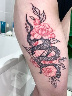 Snake with red flowers tattoo Plus Size Thigh Tattoo, Red And Black Flower Tattoo, Thigh Rose Tattoo, Thigh Tattoos Women Plus Size, Red Flowers Tattoo, Snake Hip Tattoo, Side Thigh Tattoos Women, Pretty Thigh Tattoos, Front Thigh Tattoos