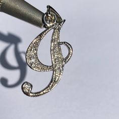 14kt White Gold Pave Diamond Letter “J” Pendant In Fancy Cursive. Pendant Has Stunning Sparkle From Diamonds In Pave Setting Weight Is Approx 3.5grams Stamped “14k” Backside Pendant Is Approx 1.25 Inches In Height And Approx 3/4inch Wide Last Picture Not My Picture, Shows How A “J” In Written In Cursive. Pendant Has Been Professionally Cleaned And Polished Pictures Are Part Of The Description So Please Take A Look And Feel Free To Ask For More Pics/Info Reasonable Offers Welcome No Trades Thanks For Taking A Look And Happy Poshing Formal White Gold Jewelry With Initials, Elegant Formal Jewelry With Initials, Elegant Silver Initials Jewelry, Elegant Silver Jewelry With Initials, Fancy Cursive, In Cursive, Letter J, Pave Setting, Pave Diamonds