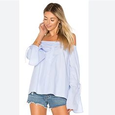 Brand New With Tags Light Blue Off The Shoulder Light Makeup Marks At Top From Try One - Should Come Out Once Washed 100% Cotton. Dry Clean Only. Elasticized Neckline. Front Button Closure. Split Bell Sleeves With Tie Closures. Revolve Style No. Likr-Ws7. Manufacturer Style No. Yw112 092ly. Armpit To Armpit: Approx 18.75" Shoulder To Bottom: Approx 23" Zz-09 Blue Off-shoulder Blouse For Day Out, Chic Light Blue Off-shoulder Top, Chic Blue Tops For Day Out, Blue Off-shoulder Top For Brunch, Light Makeup, Bell Sleeves, Off The Shoulder, Split, Top Blouse