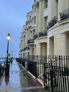 a row of townhouses on a rainy day