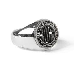 a signet ring with the new york yankees logo in black and white engraved on it