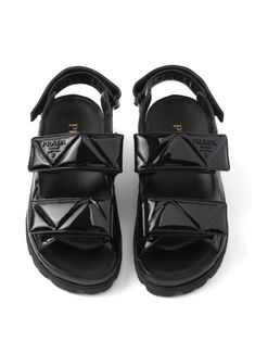 Find PRADA Logo-lettering Quilted Sandals on Editorialist. black calf leather patent finish quilted logo lettering front touch-strap fastening slingback strap round open toe branded insole ridged rubber sole Leather Sandals With Logo Strap For Spring, Spring Leather Sandals With Logo Strap, Designer Leather Sandals With Glossy Finish, Leather Sport Sandals With Logo Strap For Summer, Luxury Glossy Patent Leather Sandals, Black Glossy Finish Open Toe Sandals, Leather Sandals With Glossy Finish For Spring, Spring Leather Sandals With Glossy Finish, Designer Leather Sandals With Logo