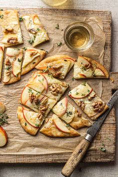 slices of apple and walnut pizza on a cutting board