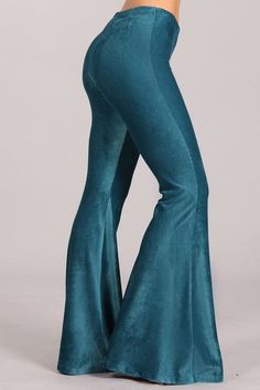 New Arrival These Modern Must Have Teal Velvet Bell Bottoms pants will add a little swing to your step this season! The soft velvet lightweight material has the perfect amount of stretch and the well hidden elastic waist adjusts to make up for a few gained or lost inches. You'll love the comfort and look of a fitted hip and thigh that's perfectly balanced with the flared cut. You can keep things casually cool with a tucked-in graphic tee, heeled boots and a wide-brim hat, or go for a more polish Velvet Bell Bottoms, Lightweight Pants, Pacific Rim, Yoga Pants Outfit, Barrel Racing, Bell Bottom Pants, Teal Color, Complete Outfits, Bell Bottom