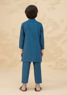 Dobby SuitFor a dapper statement dress your little one in this stone blue straight kurta featuring stitching details paired with a straight trouser.Straight kurtaColour: Stone BlueFabric: DobbyStraight TrouserColour: Stone BlueFabric: Cambric Blue Sherwani For Eid, Straight Kurta Style, Blue Transitional Straight Kurta, Blue Naqshi Cambric Kurta, Blue Shalwar Kameez For Men, Dark Blue Shalwar Kameez Men, Boys Kurta, Straight Kurta, Stitching Details, Statement Dress