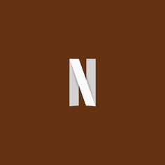 the letter n is made up of two white rectangles on a brown background