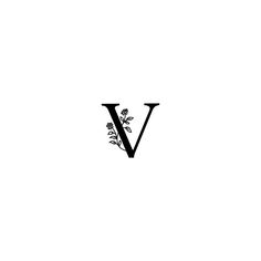 a black and white photo of the letter v with flowers on it's side