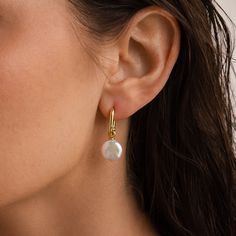 D A N G L I N G ∙ P E A R L ∙ H U G G I E S Introducing the most perfect classic Pearl Hoop Earrings one could own 🤍 Plus, two earrings in one? Say no more! Love the comfortable daintiness and minimalist style of the huggie hoops? Simply detach & store the pearl charms and -- voilà! Attach the dangling pearl charms for special occasions or whenever you feel like adding an extra touch of elegance. * Material: High Quality Solid 925 Sterling Silver  * Finish: Sterling Silver ∙ 18K Gold * Hoop Dim Minimalist Wedding Hoop Earrings, Modern Dangle Hoop Earrings For Wedding, Minimalist White Huggie Earrings For Wedding, Modern Wedding Hoop Earrings, Wedding Huggie Hoop Earrings With Pearl Charm, Modern Hypoallergenic Hoop Earrings For Wedding, Huggie Pearl Earrings With Ear Wire For Wedding, Minimalist Huggie Pearl Earrings For Wedding, Minimalist Small Hoop Pearl Earrings For Wedding