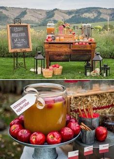 an outdoor table with apples and drinks on it, and a sign that says apple cider