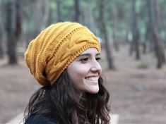 "Protect yourself from the elements in a cozy, rib-knit beanie crafted with a face-framing fit. This type of pattern has a good deal of stretch to it, and will fit a broad range of sizes. If you have any concern, please contact me and let me know about your head size. Material : In this project, The yarn I used is very high quality, 50% wool, 50% Acrylic. Color : Mustard You can add another color of this hat in this link: https://www.etsy.com/shop/SENNURSASA?section_id=8144014 or a matching scar Yellow Beret, Knit Hats For Women, Knitted Slouch Hat, Yellow Beanie, Knit Winter Hat, Oversized Hat, Slouchy Beanie Hat, Winter Boho, Hand Knit Hat