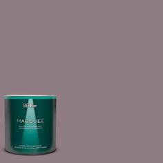 a can of behr marquee paint on a beige background with the word marquee