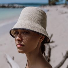 The latest addition to our crushable collection, the Yana is made from a softer crochet weave toquilla straw that can be easily packed without damaging the hat. • Handcrafted in Ecuador by Artisans • Made with 100% Natural Toquilla Straw • Brim Size: 2.8” • Size-Adjustable Inner Band Beige Handwoven Crochet Hat With Curved Brim, Beach Straw Hat With Short Brim In Sinamay, Beige Crochet Hat With Flat Brim In Toquilla Straw, Beige Handwoven Crochet Hat With Short Brim, Beige Crochet Hat With Flat Brim, Woven Toquilla Straw Crochet Hat With Curved Brim, Beige Handwoven Paper Straw Hat, Handwoven Flat Brim Crochet Hat In Toquilla Straw, Black Handwoven Straw Hat With Curved Brim