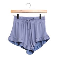 Size: Xs Color: Denim Blue Condition: In Perfect Condition With No Flaws, New Without Tags. Lulus Time To Relax Denim Blue Ruffled Drawstring Shorts Are Perfect For Lounging! These Soft Jersey Lounge Shorts Have An Elasticized Drawstring Waist, Loose Fit Shorts, And Fluttery Ruffle Hems. Trendy Blue Pajama Shorts For Spring, Casual Light Blue Ruffled Bottoms, Casual Ruffled Light Blue Bottoms, Ruffled Shorts, Lulu Shorts, What Is Trending Now, Comfy Lounge, Time To Relax, Matching Tees