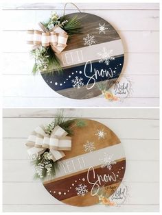 two wooden signs with bows and snowflakes on them