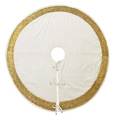 a white and gold round table cloth with an ironing board in the center on a white background