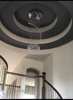 Rotunda ceiling design,  Accent ceiling,  staircase chandelier Circular Ceiling Design, Double Height Lobby, Round Stairs, Black Staircase, Kitchen Ceiling Design, Gypsum Ceiling Design, Accent Ceiling, Ceiling Domes, False Ceiling Bedroom