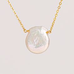 "A beautiful and delicate necklace, it will give the last touch to your modern layered look.  Perfect for mom, a friend, a sister or any special person! You will never be wrong with this lovely piece.  Flat Teardrop Freshwater Pearl Necklace * .925 Sterling Silver or 14K Rose Gold Filled or 14K Gold filled for quality heirloom (is hypoallergenic, safe for sensitive skin) * Raw material from USA or Italy, will last for years with proper care. * Beautiful package without an invoice, ready for gift Mother's Day Pearl Pendant Necklace Gift For Her, Pearl Necklace With Adjustable Chain For Gift, Pearl Necklaces With Adjustable Chain For Gifts, Pearl Necklaces With Adjustable Chain As A Gift, Minimalist White Necklace For Mother's Day, Mother's Day Gift Pearl Necklace, Mother's Day Gift Round Pearl Necklace, Dainty Pearl Pendant Necklace For Mother's Day, Dainty Pearl Necklaces For Mother's Day