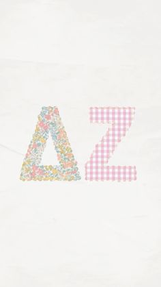 the letter z is made up of flowers and gingham fabric on a white background