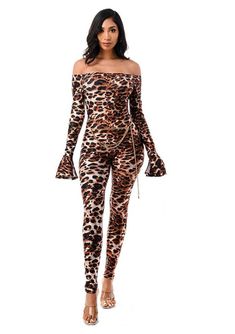 Cheetah Print Off Shoulder Jumpsuit w/ Gold Chain Waistbelt Chic Leopard Print Jumpsuits For Night Out, Chic Leopard Print Jumpsuits And Rompers For Party, Chic Leopard Print Jumpsuits And Rompers For Night Out, Brown Stretch Jumpsuits And Rompers For Party, Chic Fitted Leopard Print Jumpsuit, Chic Fitted Leopard Print Jumpsuits And Rompers, Trendy Fall Jumpsuits And Rompers For Club, Disco Jumpsuit, Party Jumpsuit