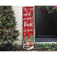 a christmas door hanger with the words it's the most wonderful time of the year