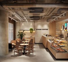 the interior of a coffee shop with tables and chairs