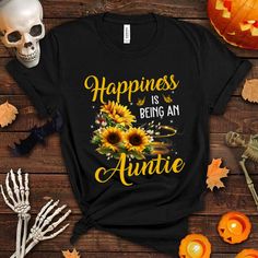 Buy Happiness Is Being An Auntie Shirt Sunflower Lovers Aunt Shirt at Fantasywears. Hight quality products with perfect design is available in a spectrum of colors and sizes, and many different types of shirts! Unisex T-Shirt – 100% Cotton (fiber content may vary for different colors) – Medium fabric (5.3 oz/yd² (180 g/m²)) – Classic fit – Tear away the label – Runs true to size Women T-Shirt – 100% combed ringspun cotton (fiber content may vary for different colors) – Light fabric (4.3 oz/yd² (146 g/m²)) – Slim fit with a longer body length – Tear away the label [...] Aunt Shirt, Auntie Shirts, Aunt Shirts, Sunflower Shirt, Happiness Is, Hight Quality, Nanny, Sew-in Labels, Sweatshirt Hoodie