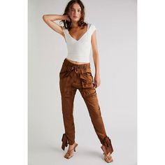 New With Tags Free People // Nicholas K Field Pants Color: Camel Size Large 100% Modal So Chic With A Sporty Edge, These Pants Are The Perfect Elevated Staple. Fit: Low-Rise, Slouchy Harem Silhouette Features: Smocked Waistband, Seamed Paneling At The Thigh, Oversized Workwear Pockets, Tie Detailing At Hems Why We <3 It: The Definition Of Cool, These Pants Are Sure To Stun With Every Wear. Waist- 18 Inches Hips- 22 Inches Rise- 13 Inches Inseam- 26 Inches Label Has Been Marked To Prevent Store R Brown Summer Cargo Pants For Workwear, Brown Summer Cargo Pants For Work, Chic Brown High-waisted Cargo Pants, Chic Brown Cargo Trousers, Sibling Duo, Sustainable Textiles, Deep Connection, Jumpsuit Trousers, Free People Pants