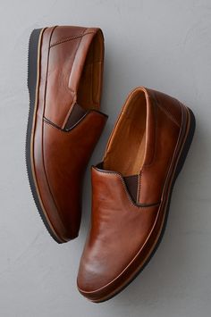 Handsome and comfortable, the Rocco leather shoes will dress up or down any summer style. Elastic gore panels make each wear easy to slip into, while the arch support built into the cushioned leather footbed provides all day comfort. Leather Slip-ons With Leather Footbed, Brown Swift Leather Casual Slip-ons, Comfortable Slip-on Leather Shoes, Leather Slip-ons For Formal Summer Wear, Leather Slip-ons With Round Toe And Leather Footbed, Leather Slip-on Dress Shoes With Branded Insole, Leather Closed Toe Slip-ons For Business Casual, Slip-on Leather Shoes With Ortholite Insole For Work, Leather Slip-ons With Flat Heel And Leather Sole