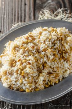 rice and nuts are piled on top of each other