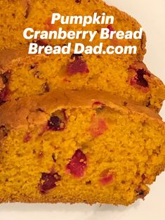 two slices of pumpkin cranberry bread on a white plate with text overlay