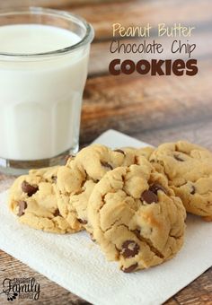 peanut butter chocolate chip cookies next to a glass of milk