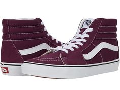 Vans SK8-Hi - Skate Shoes : Grape Wine/True White : Keep it old school every step of the way with the classic Vans SK8-Hi skateboard shoes! High-top skate shoes with a classic silhouette and Sidestrap detail. Uppers of suede, leather, or canvas. Cotton drill lining. Padded collar for added comfort and support. Triple-stitch collar adorns collar. Die-cut EVA insert. Vulcanized construction: • Slimmed-down profile offers a flexible feel. • Gum rubber outsole with signature waffle tread provides su Vans High-top Canvas Shoes, High Top Purple Vans, Purple Vans High-top Sneakers, Vans High-top Sneakers For Skateboarding, Vans High-top Textile Skate Shoes, Classic Vans, Sk8 Hi, Vans High Top Sneaker