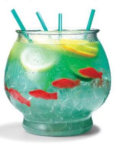 goldfish in a fish bowl with drinking straws