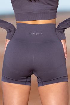 The ultimate shorts for training and leisure: Our anthracite seamless high waisted biker shorts are perfect for training in the gym or running errands! for: training and leisure feel: smooth / sweat-wicking / nylon/spandex material fav: shape-enhancing / high waisted / no front seam fashion: pair with your favorite oversized t-shirt or complete the set with a navano long-sleeve crop top model wears size S model height: 5'7"length: 13.5in In The Gym, Cute Shorts, Biker Shorts, Top Model, Oversized Tshirt, S Models, Long Sleeve Crop Top, The Gym, Model Height