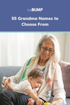 an older woman sitting on top of a couch holding a baby