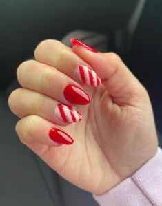 candy cane, red, nail ideas, aesthetic, holiday, christmas, design inspo Simple Christmas Nails Candy Cane, Candy Cane French Tip Nails Almond, Red Candy Cane Nails, Candy Cane Nails Short, Candy Cane Stiletto Nails, Christmas Nails Candy Cane, Candy Cane Nail Designs, Candy Cane Christmas Nails, Christmas Acrylic Nails Candy Canes