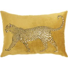 a gold pillow with a leopard on it's front and side, in the shape of a cheetah