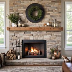 a living room with a fire place and wreath on the mantle