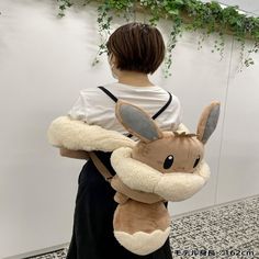 Get ready to catch 'em all with these limited edition Eevee backpacks! Perfect for any Pokémon fan, these fluffy plush backpacks from the Pokémon Center Japan feature a cute button and measure 83cm/32.6in. Don't miss out on this amazing addition to your collection. #Pokemon #Eevee #Backpack #LimitedEdition #PokemonCenterJapan Pokemon Themed Bedroom, Pokemon Bag, Pokemon Accessories, Pokemon Center, Pokemon Eevee, Plush Backpack, Catch Em All, Pokemon Fan, Anime Figures