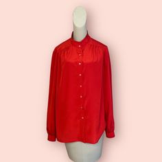 Vintage 1970s Schrader Sport Vintage Red Blouse in Size 14. Gorgeous vibrant red color. Excellent vintage condition!  Measurements in inches (garment laying flat) Pit to pit: 20 Sleeve: 23 Shoulders: 18 Length: 26 Vintage Red Long Sleeve Blouse, Classic Red Blouse For Fall, Vintage Red Shirt For Spring, Vintage Red Tops With Button Closure, Vintage Red Top With Button Closure, Vintage Red Blouse For Fall, Vintage Red Shirt For Fall, Red Vintage Shirt For Fall, Classic Red Shirt For Daywear