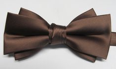 "Beautiful pre-tied and adjustable double tiered banded bow tie. Will adjust from 13\" through 20\" neck. Bow dimensions 2.5\" x 4.5\". Bow tie  Always made by hand and to your special order. Weddings and groups are welcome." Adjustable Pre-tied Decorative Bow, Pre-tied Adjustable Bow For Party, Formal Adjustable Bow Tie With Butterfly Knot, Adjustable Solid Bow For Formal Occasions, Adjustable Solid Color Bow For Formal Occasions, Adjustable Solid Color Formal Bow, Elegant Adjustable Pre-tied Bow, Elegant Brown Bow Ties, Adjustable Solid Satin Bow