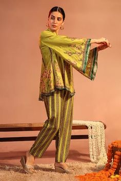 Yellow kalidar kurta featuring floral embroidery with sequins and scallop hem detailing. Paired with coordinating straight pants in a printed design., Fit: Relaxed Pista Green Saree Set For Spring, Traditional Sets With Pallu For Spring, Traditional Spring Sets With Pallu, Bohemian Pista Green Sets For Eid, Festive Green Bohemian Pant Set, Traditional Sharara With Pallu For Spring, Traditional Spring Sharara With Pallu, Anarkali Set With Pallu For Spring, Spring Saree Set With Pallu Detail