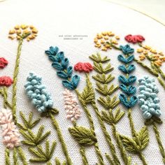 the embroidery is done and ready to be sewn on with it's colorful flowers