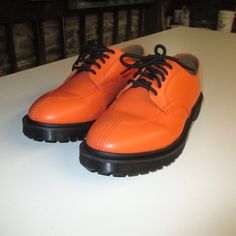 Supreme X Doc Martens Orange Size: Us 10 / Eu 43 Color: Orange Condition: Brand New Orange Sneakers With Vibram Sole And Round Toe, Classic Orange Sneakers With Rubber Sole, Supreme Shoes, Doc Martens, Black Orange, Color Orange, Orange Black, Size 10, Man Shop