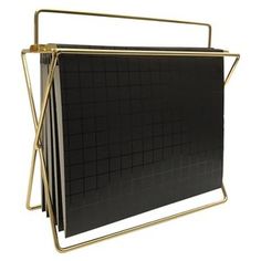 a black binder with gold metal frame and grids on it, set against a white background