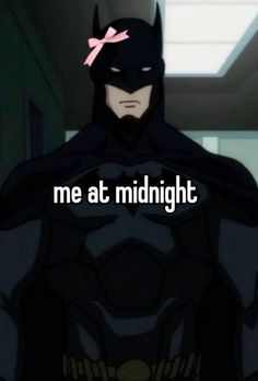 batman with the words me at midnight on it's chest and pink bow in his hair