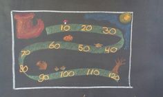 a chalk board drawing with numbers and animals on it