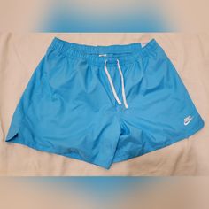 Nike Club Men's Woven Flow Shorts Size Xxl Color: Blue New With Tags Mesh Lining,Drawstring Right Above The Knee Length $35 Nike Blue Swim Trunks For Summer, Nike Blue Casual Swim Trunks, Casual Blue Nike Swim Trunks, Nike Tech Shorts, Fit University, Flow Shorts, Nike Basketball Shorts, White Chinos, Nike Swim