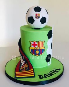 a birthday cake with a soccer ball on top